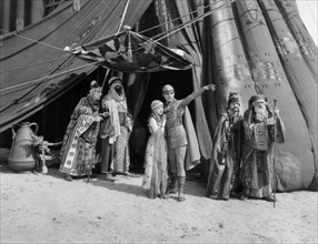 May McAvoy, Ramon Novarro, (center), on-set of the Silent Film "Ben-Hur", 1925