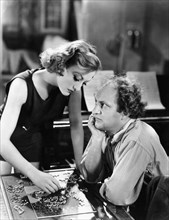 Joan Crawford, Larry Fine, on-set of the Film "Dancing Lady", 1933