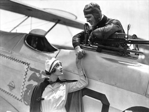 Lila Lee, Ralph Graves, on-set of the Film "Flight", 1929