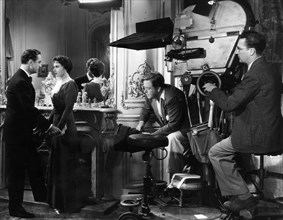 William Powell, Luise Rainer, Director Robert Z. Leonard,  on-set of the Film "The Great Ziegfeld", 1936