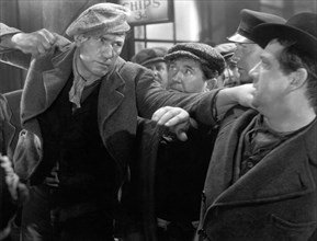 Victor McLaglen, (left), on-set of the Film "The Informer", 1935