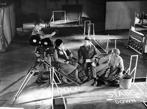 Cinematographer Karl Struss, Writer Fannie Hurst, Director Herbert Brenon, Winifred Westover, on-set of the Film "Lummox", 1930