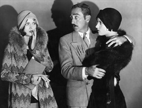 Lucille Powers, Adolphe Menjou, Nora Lane, on-set of the Silent Film "Marquis Preferred", 1929