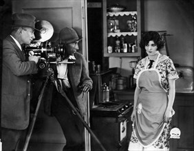Cinematographer L. Guy Wilky, Director William DeMille, Claire Adams, on-set of the Silent Film "Men and Women", 1925