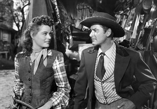 Alexis Smith, Errol Flynn, on-set of the Film "Montana", 1950