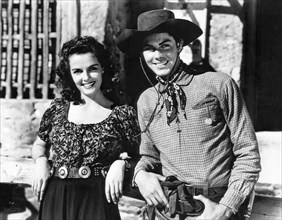 Jane Russell, Jack Buetel, on-set of the Film "The Outlaw", 1943