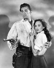 Robert Mitchum, Teresa Wright, on-st of the Film "Pursued", 1947