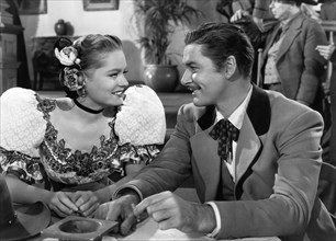 Alexis Smith, Errol Flynn, on-set of the Film "San Antonio", 1945