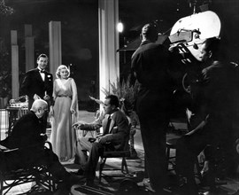 Lionel Barrymore, Walter Pidgeon, Jean Harlow, director Jack Conway, on-set of the Film "Saratoga", 1937