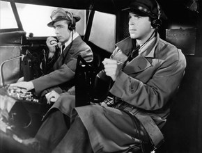 John Howard, Fred MacMurray, on-set of the Film "Thirteen Hours by Air", 1936