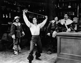 Eugene Pallette, Douglas Fairbanks, Leon Bary, George Siegmann, on-set of the Silent Film "The Three Musketeers", 1921