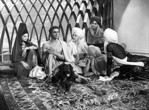 John Justin and Harem Girls, on-set of the Film "The Thief of Baghdad", 1940