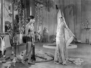 Anna May Wong, Julanne Johnston, on-set of the Silent Film "The Thief of Baghdad", 1924