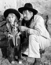 Wallace Beery and his daughter, Carol Ann Beery, on-set of the Film "Viva Villa!", 1934