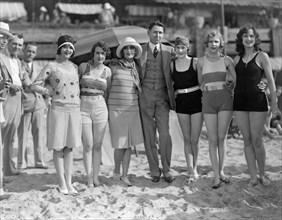 Carole Lombard, (third from left), Portrait on Beach, circa late 1920's