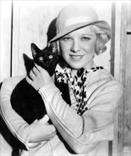 Actress Glenda Farrell, Portrait with Cat, circa mid-1930's