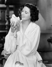 Actress Kay Francis, Portrait with Dove, circa mid-1930's
