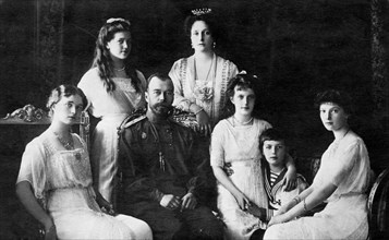 Nicholas II, Czar of Russia, with (left to right), Olga, Maria, Czarina Alexandra, Anastasia, Alexei, Tatiana, ca. 1914