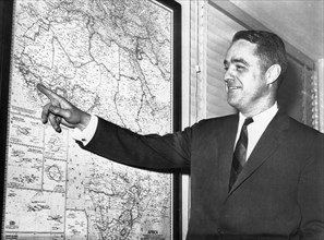 Robert Sargent Shriver, Jr., U.S. Statesman and Activist, Portrait Pointing at Map of Africa While Director of Peace Corps, 1961