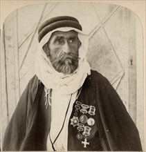Sheikh el Rachid, Chief of the Escorts and greatest Bedouin of Palestine, Single Image of Stereo Card, 1900