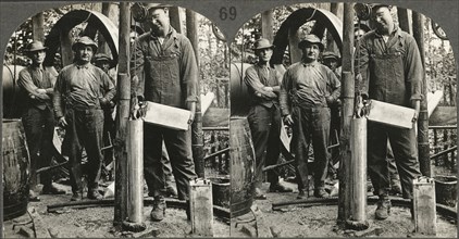 Filling Shell with Nitro-Glycerine, Preparatory to Shooting the Well, Oil Field in Penn’s”, Stereo Card, circa 1915