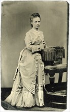 Portrait of Standing Adult Woman in Long Dress with Large Buttons, circa 1870