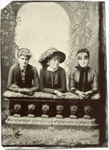 Portrait of Three Adult Women, Kneeling Against Stone Bannister, circa 1870