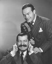Bob Hope with Jerry Colonna, on-set of his Radio Program, The Pepsodent Show Starring Bob Hope, NBC, 1940