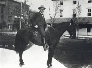 Booker T. Washington (1856-1915), Portrait on Horse in front of Tuskegee Institute, Alabama, USA, 1912