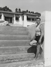 Actor George Bancroft, Portrait in Bathing Suit on Steps, Santa Monica, California, USA, 1930's