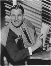 Richard Arlen, Smiling Portrait Sitting in Director's Chair, Publicity Portrait for the Film, "Hot Saturday", 1932