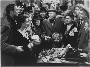 Frank Faylen, H. B. Warner, Beulah Bondi, Donna Reed, James Stewart, Lillian Randolph, Thomas Mitchell, on-set of the Film, “It's a Wonderful Life”, 1946