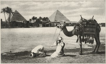 Morning Prayer along Nile River with Pyramids in Background, Cairo, Egypt, 1939