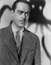 John Eldredge, on-set of the Film, "Sh! The Octopus", Warner Bros., 1937