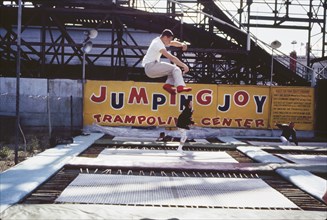 Four People on Amusement Park Trampolines, Coney Island, New York, USA, August 1961