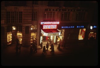 Monseigneur News Theater at Night, Piccadilly Circus, London, England, UK, 1960