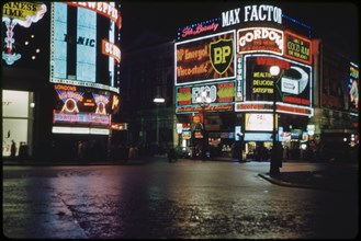 Street Scene at Night, Piccadilly Circus, North Side, London, England, UK, 1960
