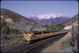 California Zephyr Train with Snow-Capped Mountains in Background, Utah, USA, 1964