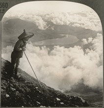 Two Miles above the Clouds-From Fuji toward Lake Yamanaka 10 miles away, Japan, Single Image of Stereo Card, Keystone View Company, early 1900's