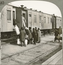 Boarding the Train at Kansk, Siberia, Single Image of Stereo Card, Keystone View Company, early 1900's