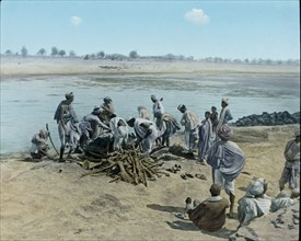 Corpse on Pyre, Hindu Funeral, Lower Ganges, Uttar Pradesh, India, Hand-Colored Magic Lantern Slide, Newton & Company, 1930