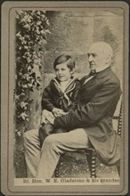William Ewert Gladstone (1809-98), British Politician and Prime Minister, Seated Portrait with Grandson, 1881