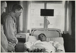 Adolf Hitler visiting Injured Man in Hospital, Germany, 1931