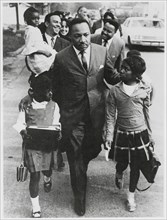 Martin Luther King Jr. Escorting Schoolchildren to Newly Integrated School, Andrew Young, Joan Baez and Hosea Williams in Background, Grenada, Mississippi, USA, September 20, 1966