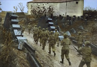 Troops Moving Through Dragon's Teeth of West Wall Fortifications, Rhineland Campaign, Germany, 1945