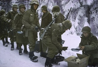 Soldiers Receiving Food at Field Mess, Ardennes-Alsace Campaign, Battle of the Bulge,1945