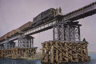 Transportation Corps moving over Bridge that was Constructed Across Rhine River at Wesel, Germany, Central Europe Campaign, Western Allied Invasion of Germany, 1945