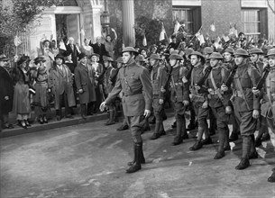 James Craig (center leading March), on-set of the Film, "Friendly Enemies", United Artists, 1942