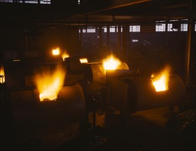 Rotary, Oil-Fired Melting Furnaces, Destination of the Finished Aluminum Products is Kept Secret, Aluminum Industries, Inc., Ohio, USA, Alfred T. Palmer for Office of War Information, February 1942