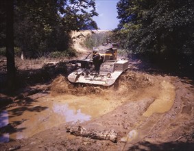 Light Tank Going Through Water Obstacle, Fort Knox, Kentucky, USA, Alfred T. Palmer for Office of War Information, June 1942